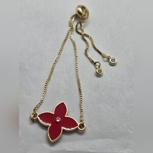 Elegant Fashion Red and Goldtone Flower Bracelet